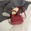 Bolso Cubo Transfronterizo para Mujer Nueva Colección Primavera/Verano 2026 Bolso de Hombro Cruzado Versátil con un Toque de Lujo para Viajar al Trabajo y Llevar en la Mano