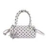 Bolso cruzado de un solo hombro de diseño único para mujer, bolso de mano simple y versátil estilo coreano, nuevo bolso de moda 2026 con lunares para el día a día