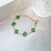 Set de trébol de cuatro hojas de acero de titanio de doble cara transfronterizo de Amazon: pulsera, collar, pendientes, anillo, juego de cuatro piezas, joyería que no se decolora