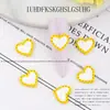 Nuevos adornos para uñas de amor con pintura esmerilada de aleación, adornos para uñas de corazón hueco macarrón tridimensional al por mayor