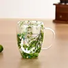 Taza de doble capa de vidrio de borosilicato con flores secas y asa, creativa, aislamiento de alta temperatura, taza de café ins, venta al por mayor