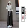 Pantalones de mujer de pierna ancha, holgados, a la moda y casuales, de cintura alta, con finas rayas, bolsillos y un diseño de pierna recta y fluido, hechos de terciopelo de algodón, para otoño e invierno 2026