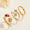 Anillo de dedo índice de flor de cuatro pétalos de insecto Mili de nicho con índice de circonita incrustada, color acero inoxidable, anillo de joyería de moda personalizado para mujer