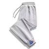 2024 Nuevos Pantalones Casuales Holgados para Hombre Estilo Hong Kong Modernos Versátiles Pantalones Delgados de Primavera y Otoño Pantalones Deportivos Venta al por Mayor por Lote