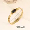 Nova Joia Europeia e Americana de Aço Titânio, Pulseira Olho com Gotejamento de Óleo, Pulseira Oca de Aço Inoxidável Estilo Corte com Turquesa Incrustada