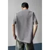 2026 Verano Patrón Espina de Pescado Cuello en V Manga Corta para Hombre Nueva Camiseta Estilo Americano Marca de Tendencia Juvenil Holgada Casual Media Manga
