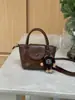 Bolsa Pequena Retro Color-blocking Feminina 2026 Outono/Inverno Nova Bolsa de Mão High-end Simples Versátil para o Dia a Dia Moda Bolsa Transversal