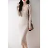Vestido de Punto con Escote en V Semiabierto 2026 Nuevo Estilo Primavera y Otoño de Longitud Media Ajustado Vestido Básico Elegante Ajustado Vestido Suéter
