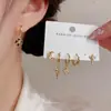 Pendientes de aro cruzados de estrella y luna personalizados exagerados transfronterizos europeos y americanos, aretes de estilo elegante, simple, dulce y genial al por mayor