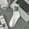Calcetines de talla grande transfronterizos, calcetines de algodón de moda para hombre, medias de color sólido en blanco y negro, calcetines de baloncesto de primavera y verano para mujer, al por mayor