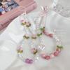 Ins principios de primavera flor de tulipán rosa cadena de cuentas para teléfono móvil niña cadena de cuentas colgante para funda de teléfono móvil femenino