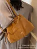 Bolsa Tote Nova de Grande Capacidade 2025 Camurça Casual Versão Coreana Ins Versátil Bolsa de Mão Bolsa de Ombro Moda Tendência Luxo Leve