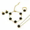 Set completo de accesorios de trébol de cinco hojas de venta caliente transfronterizo, conjunto de collar, pendientes, anillo y pulsera de acero de titanio con nácar de lujo ligero, suministro