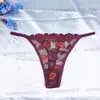 Tanga sexy de encaje bordado transfronterizo con estampado de labios, seductor para mujer, estilo europeo y americano, entrepierna de algodón puro, en stock