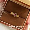 Nuevo Anillo de Trébol de Cuatro Hojas Morado Esmaltado Dorado Arena Estilo Chino Elegancia Incomparable Nuevo Estilo Nacional Anillo de Dedo Hueco de Trébol de Cuatro Hojas
