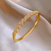 Pulsera Redonda Entrelazada Hueca Transfronteriza Europea y Americana, Pulsera de Declaración Moderna y Única, Joyería de Lujo Ligero de Gama Alta para Mujeres
