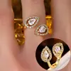Anillo Abierto de Zirconia en Forma de Gota de Luz de Lujo Transfronterizo, Diseño de Nicho con Acabado de Alta Gama, Anillo Versátil y Ajustable para el Dedo Índice