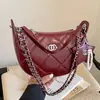 Bolsas de designer de nicho transfronteiriças para mulheres 2026 nova moda bolsa versátil com corrente bolsa tiracolo bolsa de bolinho requintada super popular