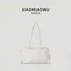Bolsa tipo almohada Boston versión coreana 2026, bolso de mano ligero casual simple de color liso para estudiantes, bolso de hombro para mujeres para ir al trabajo