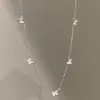 Mini Collar de Cinco Mariposas Estilo Coreano Nicho Lujo Ligero Simple Versátil Cadena de Clavícula de Gama Alta