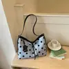 Bolso de mano informal simple de lunares transfronterizo para mujer, nuevo de moda verano 2026 de alto valor, para el trabajo, de hombro y cruzado