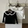 Conjunto de Dos Piezas para Bebé Niña Estilo Nuevo de Primavera: Vestido Chaleco de Lunares con Elegante Lazo y Volantes + Camiseta Base