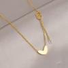Collar de acero de titanio en tono dorado para mujer, no se decolora, lujo ligero, nicho, joyería de cadena para la clavícula, de alta gama, versátil, a la moda y para el temperamento