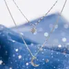 Collar de doble capa estilo ins coreano plata flash Diamante Estrella Luna nicho diseño cadena clavícula femenina lujo ligero nuevo