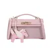 Bolso de mujer de alta calidad 2026 nueva moda bolso cruzado versátil bolso de mano exquisito súper popular bolso Kelly bolso cuadrado pequeño