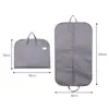 Bolsa a Prueba de Polvo para Guardar Ropa en Stock Bolsa de Mano para Empaquetar Trajes Cubierta Antipolvo Bolsa Cubre Traje Tela No Tejida Bolsa Plegable para Trajes