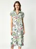 Nuevo vestido camisero floral de solapa estilo comercio exterior, sin mangas, abierto al frente, corte holgado, estilo vacación en la playa
