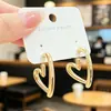 Pendientes de Corazón de Gama Alta y Elegantes para Mujer, Diseño Sencillo y Único de Nicho, Nuevos Pendientes de Aro Lisos en Forma de Corazón