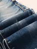 Jeans de Primavera Europeos Nuevos para Hombre con Graffiti Salpicado de Tinta Desgastada, Pantalones Skinny Ajustados Elásticos Rasgados