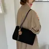 Bolsa de ombro retrô, minimalista e casual estilo coreano para mulheres, nova coleção 2026, apresentando uma textura única, grande capacidade e um design moderno adequado para o dia a dia.