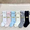 Calcetines de Otoño e Invierno para Niñas Estilo Coreano Medias Lindas de Otoño Estilo Princesa Versátiles Calcetines Medios con Lazo para Niños