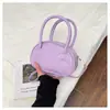 Bolso de mano de color liso estilo coreano para mujer, nueva moda de verano 2026, elegante y exquisito bolso tipo concha, moderno bolso cruzado casual