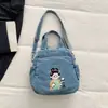Bolsa de Denim Lavado Bordada Resistente Linda para Estudiantes Modelo Nuevo 2026 Estilo de Alta Gama Doble Hombro Hombro Único Cruzada de Hombro Moderna
