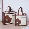 Bolsas de vestuário personalizáveis com tema de coelhinho fofo, feitas de tecido não tecido laminado espessado, com impressão de logotipo e publicidade 3D para fins de compras.
