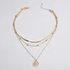 Collar con colgante de loto multicapa simple y nuevo con personalidad de moda popular recomendado en Europa y Estados Unidos, cadena para el cuello con cadena de cuchillas para mujer.