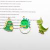 Accesorios de joyería DIY estrictamente seleccionados caricatura pequeño dinosaurio monstruo aleación gota de aceite colgante gota de aceite tocado