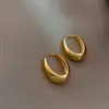 Brincos Ovais Minimalistas Coreanos com um Toque Retrô Cool, Luxo Leve, Design de Nicho de Alta Qualidade