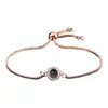 Nuevo brazalete de proyección de venta caliente transfronteriza imagen a color foto personalización nano 100 idiomas Te amo brazalete