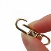 Venta al por mayor de fábrica colgante galvanizado accesorios de herrajes para bolsos de mujer hebilla de gancho hebilla para equipaje hebilla de placa pequeña de metal hebilla para perro hebilla para llavero hebilla de gancho