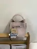 Bolsa de Mão Retrô Transfronteiriça para Mulheres Moda Primavera 2026 Bolsa Saco Design de Nicho Bolsa Transversal para Mulheres Conjunto