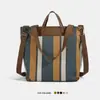 Bolsa de Lona Rayada Bloque de Color de Nicho Transfronteriza para Mujer, Nueva Moda Primavera 2026 Bolsa Grande de Hombro y Cruzada