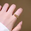 Anel X-Shaped Europeu e Americano Cruzado Banhado a Cobre Ouro Real 18K Micro-Cravejado Zircônia Estilo Quente para Mulheres Anel Versátil