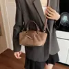 Bolso Mujer 2026 Moda Versátil Bolso de Mano Bolso al Hombro Sentido Versátil Temperamento Nuevo Viaje Diario Casual Otoño Cuadrado Pequeño