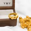 Anillo de diseño de espiral de lujo, sencillo y de alta gama, con diseño de nicho personalizado, chapado en oro de 18 quilates y titanio.