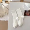 Calcetines de Mujer Estilo Coreano con Botones de Flores Pequeñas, Calcetines de Micro Presión Nuevos Otoño e Invierno, Calcetines sin Costuras de Media Pantorrilla, Color Sólido, Calcetines Slouch Simples Versátiles