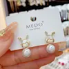 Pendientes de botón de plata S925 con aguja de plata, elegantes, microincrustados con circonita, diseño de conejo y perla, para mujer, estilo coreano, modernos, dulces, pendientes